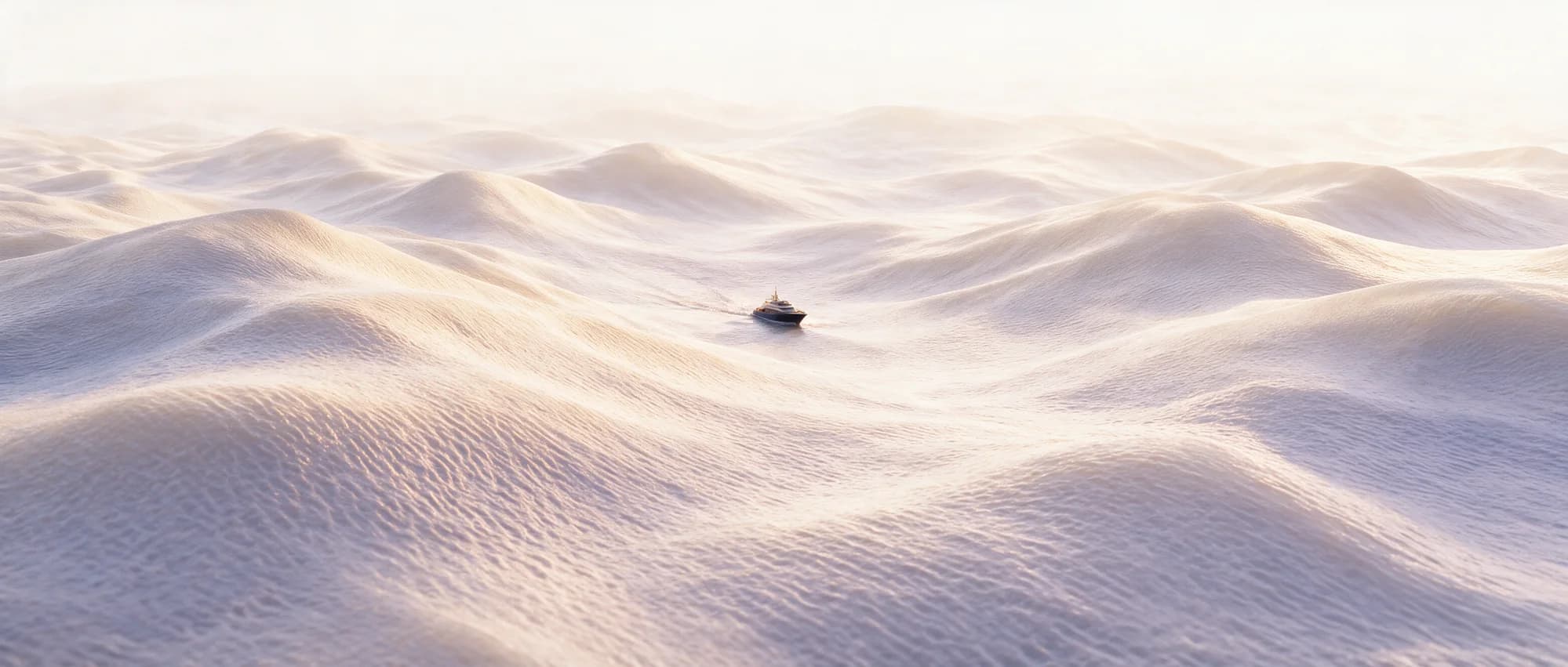 A small yacht sails through a wide, softly shaped seascape in bright morning light